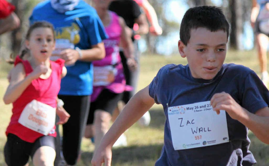 Zac Wall sprints to the finish line in the 4.6km cross country event on Saturday.